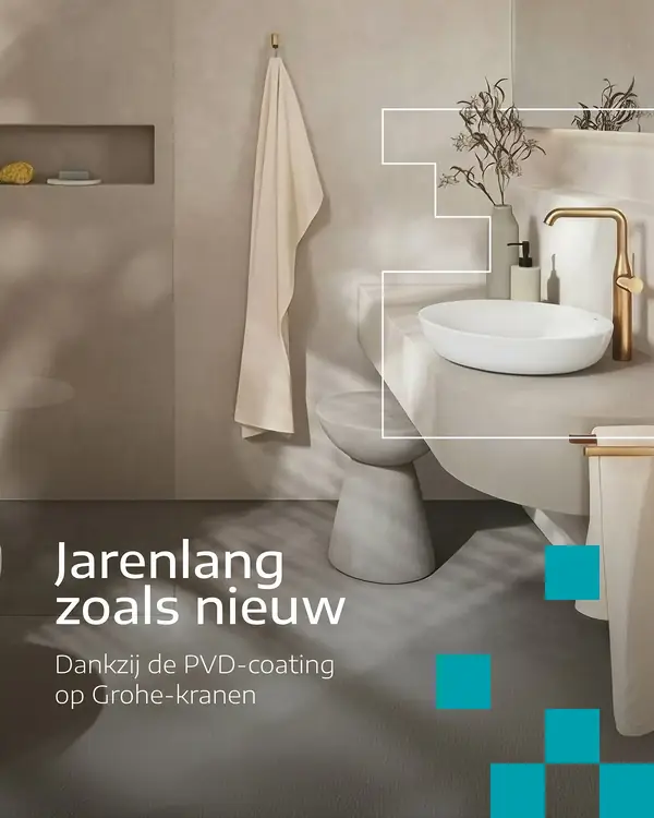 Grohe-kranen met goudkleurige afwerking naast een witte waskom bij Dannenberg Tegels & Sanitair BV in Rijssen